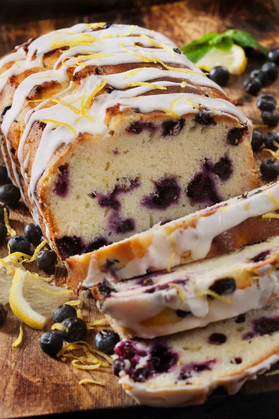 Calgary Food Photography. Blueberry loaf with lemon glaze and citrus rind garnish.