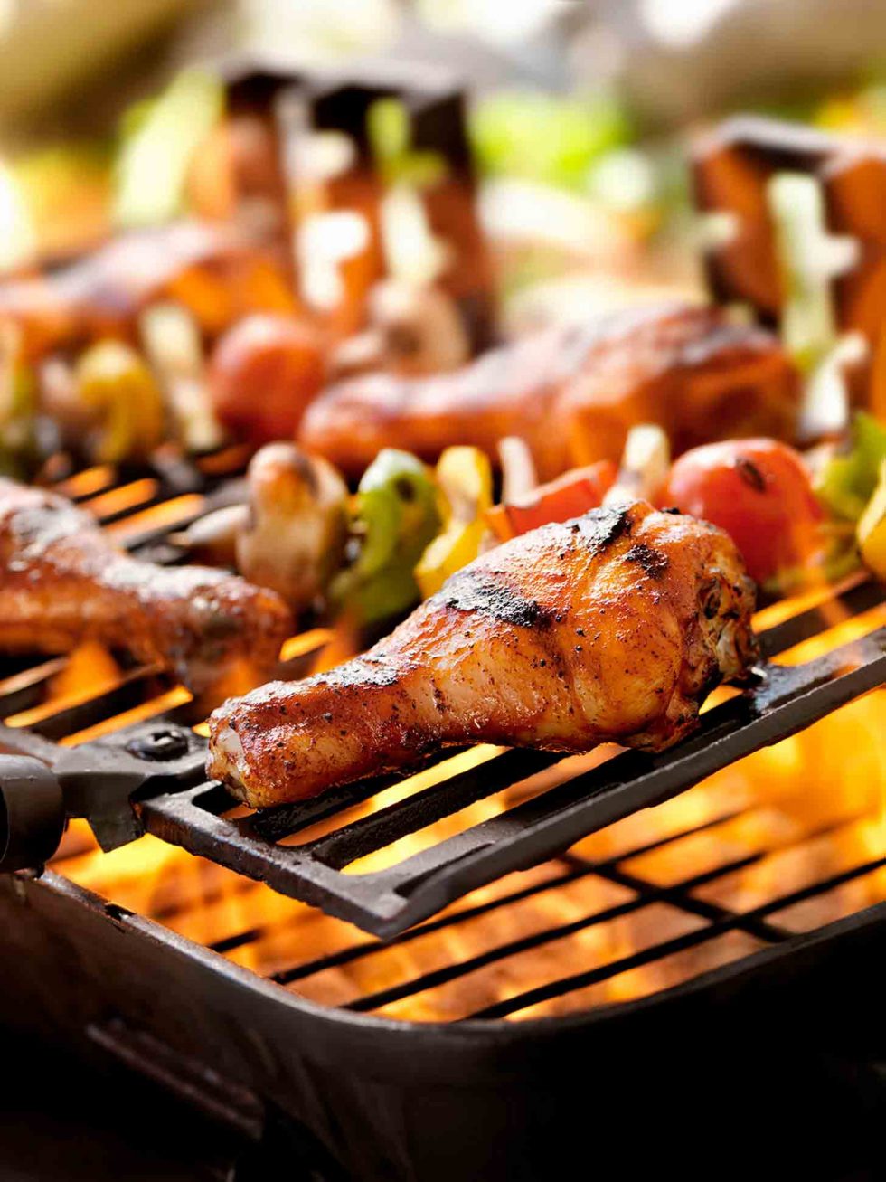 Calgary Food Photography. Chicken drumsticks and veggie skewers on the barbeque.