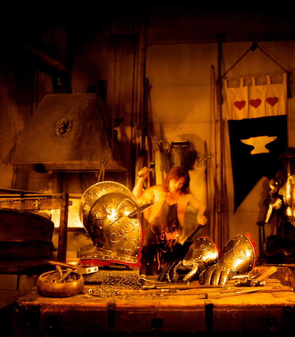 Calgary Product Photgrapher. Man in background wokring in the forge.